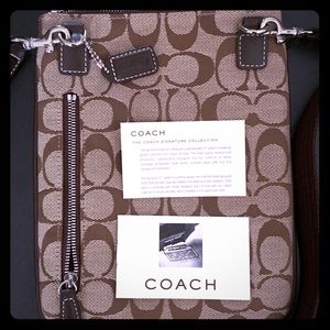 Authentic Coach "messenger" type bag. Never used.
